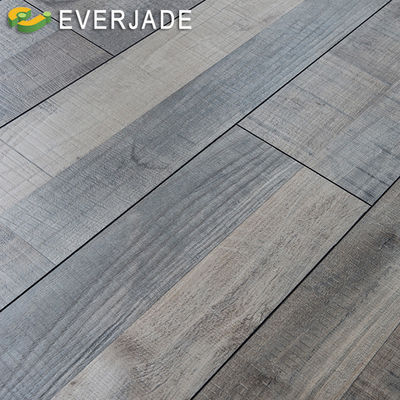 Actualice su hogar con suelos laminados impermeables en relieve para decorar la moda