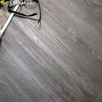 Plancha de suelo de vinilo de 4 mm SPC con textura de madera a prueba de fuego y capacidad de diseño gráfico